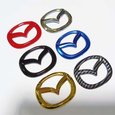 Mazda wheel steering 60x48mm glue back